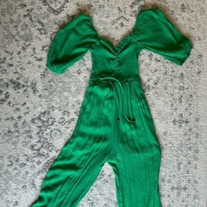 Adorable green summer jumpsuit. Maternity/bump friendly!